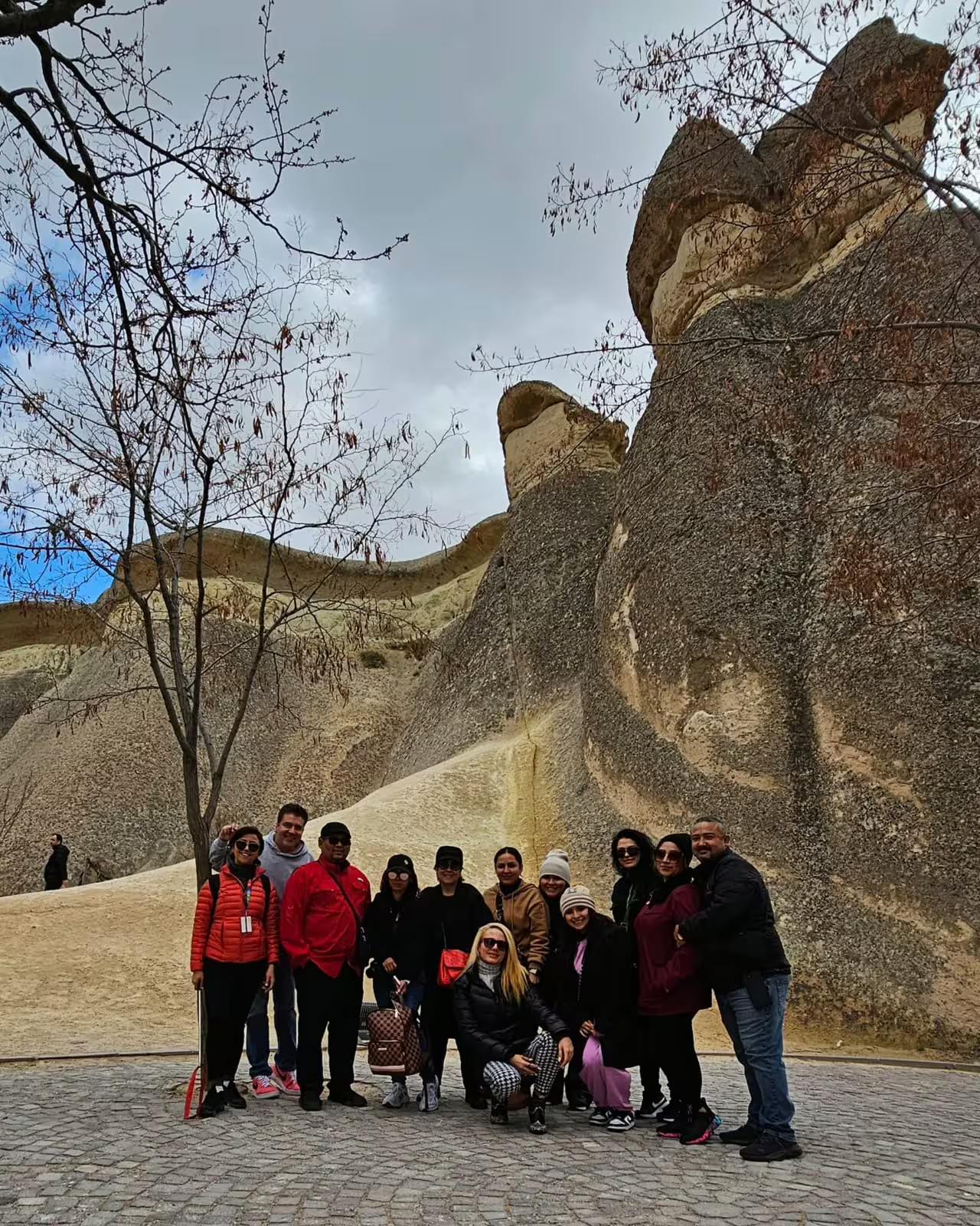 Group photo at Cappadocia fairy chimneys on Full Day Cappadocia from Istanbul by flight guided tour