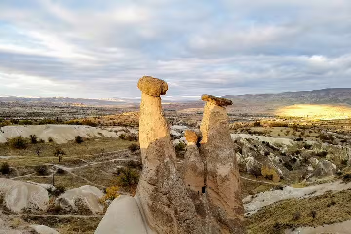 Cappadocia fairy chimneys at sunset, scenic stop on the 7 Churches of Revelation 10-day tour with Istanbul