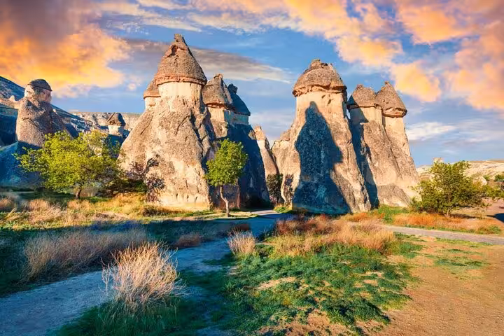 Fairy chimneys in Cappadocia at sunset, a highlight photo stop on the Green Tour with lunch included