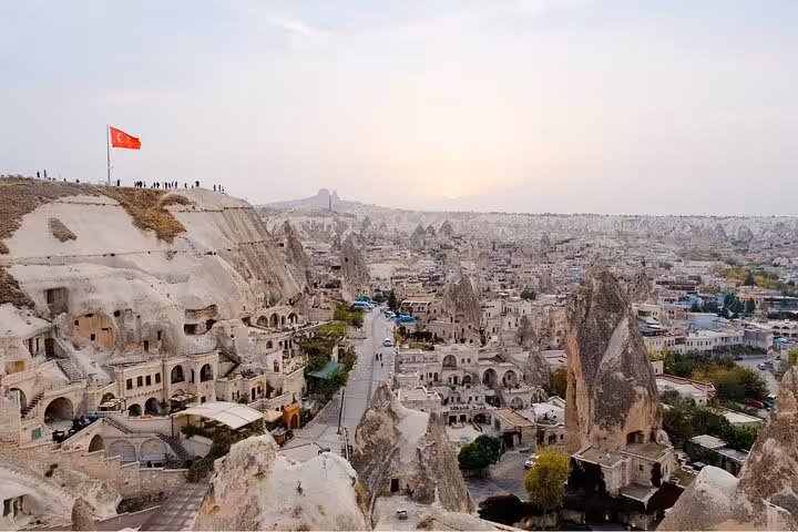 Panoramic Goreme viewpoint over Cappadocia fairy chimneys on daily tour from Istanbul hotel pickup