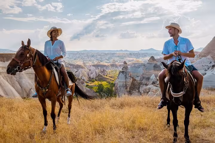 Private guided Cappadocia tour with scenic horseback ride over fairy chimneys at sunset