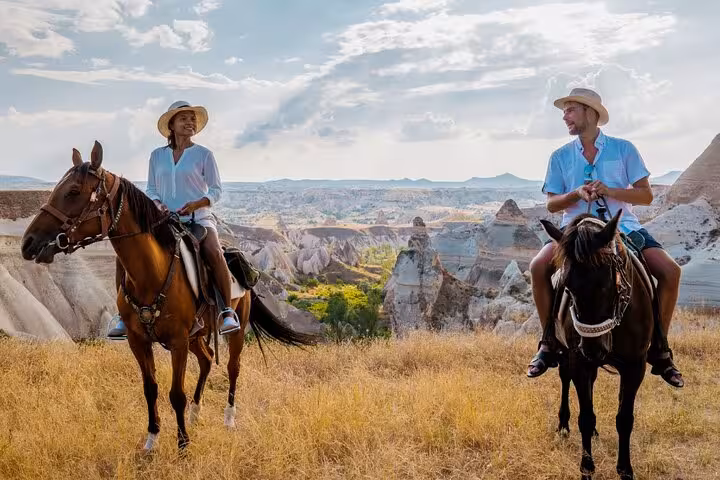 Private guided Cappadocia 2-day tour with horseback riding over fairy chimneys and valleys at sunset