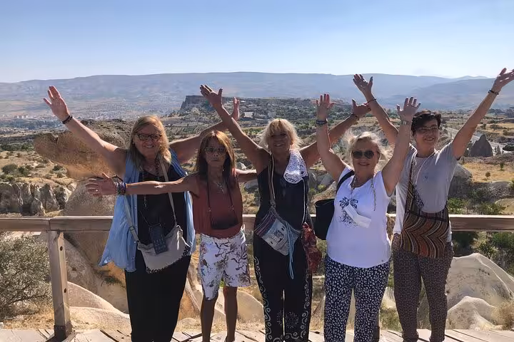 Spanish-speaking group enjoying panoramic viewpoint in Cappadocia on 2-day tour with internal flights