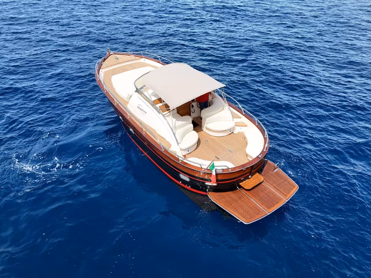 Luxury private boat on the Tyrrhenian Sea off Capri, perfect for a 6-hour swim, relax and explore tour