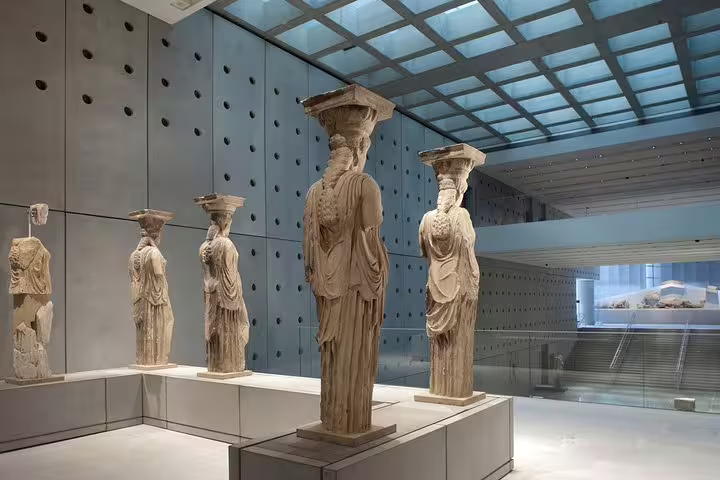 Caryatid statues in Acropolis Museum gallery, key stop on Athens Acropolis and Museum Friday night tour experience