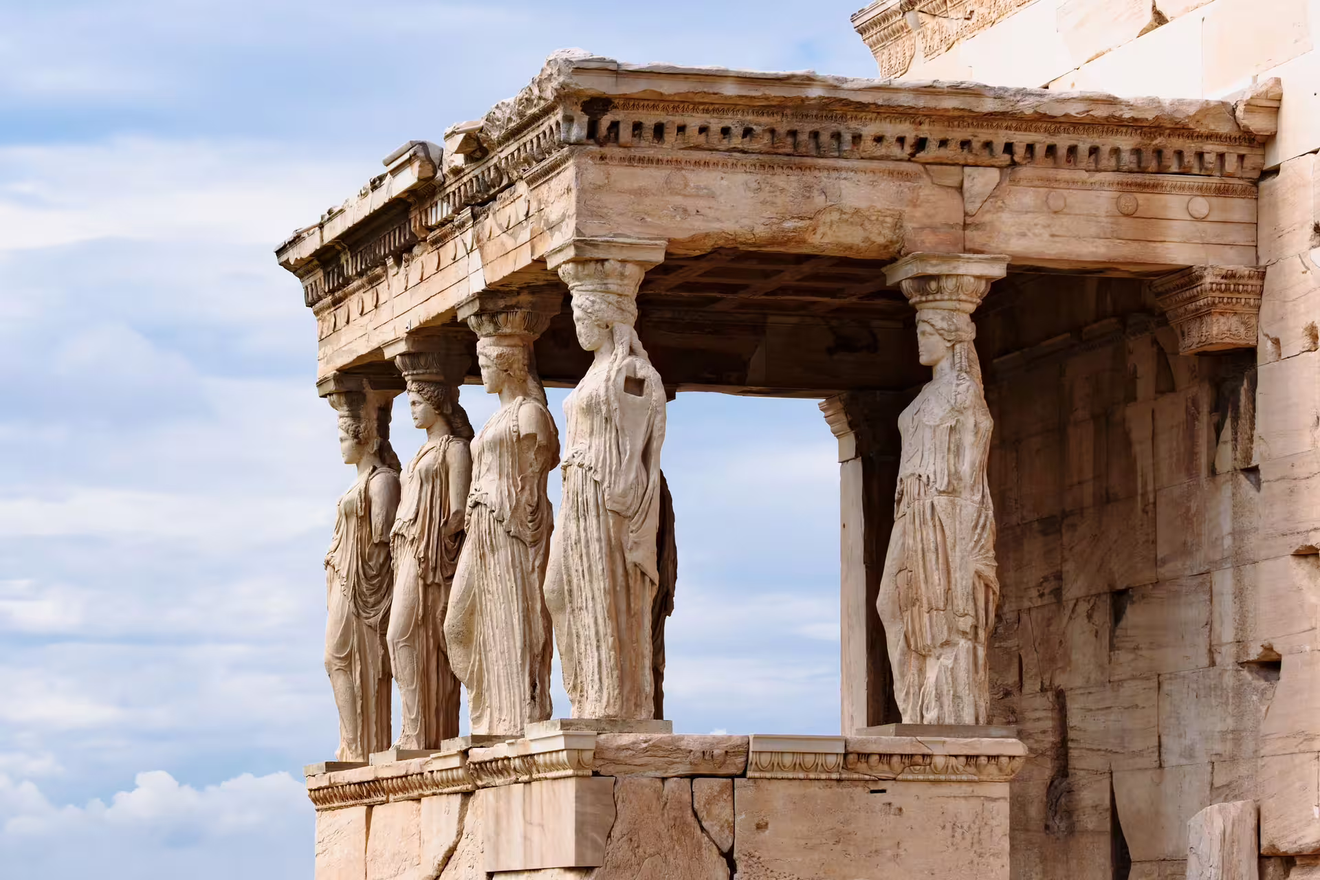 Caryatids of the Erechtheion porch on Athens Acropolis, guided Best of Athens tour before Cape Sounion sunset