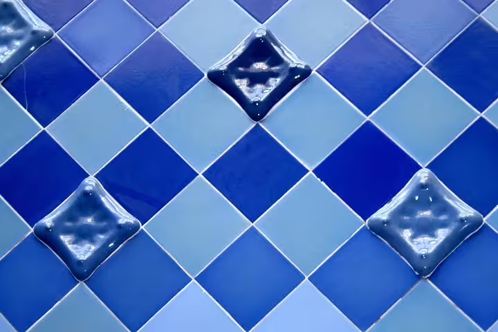 Close-up of Casa Batlló’s blue ceramic tiles, highlighting Gaudí’s mosaic details on the guided La Pedrera morning tour