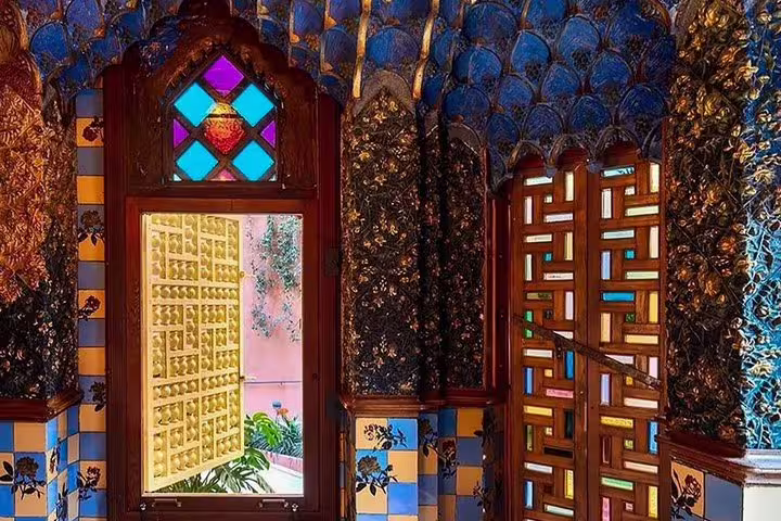 Vibrant interior of Casa Vicens showcasing Antoni Gaudí's signature colorful tiles and stained glass on a private tour.