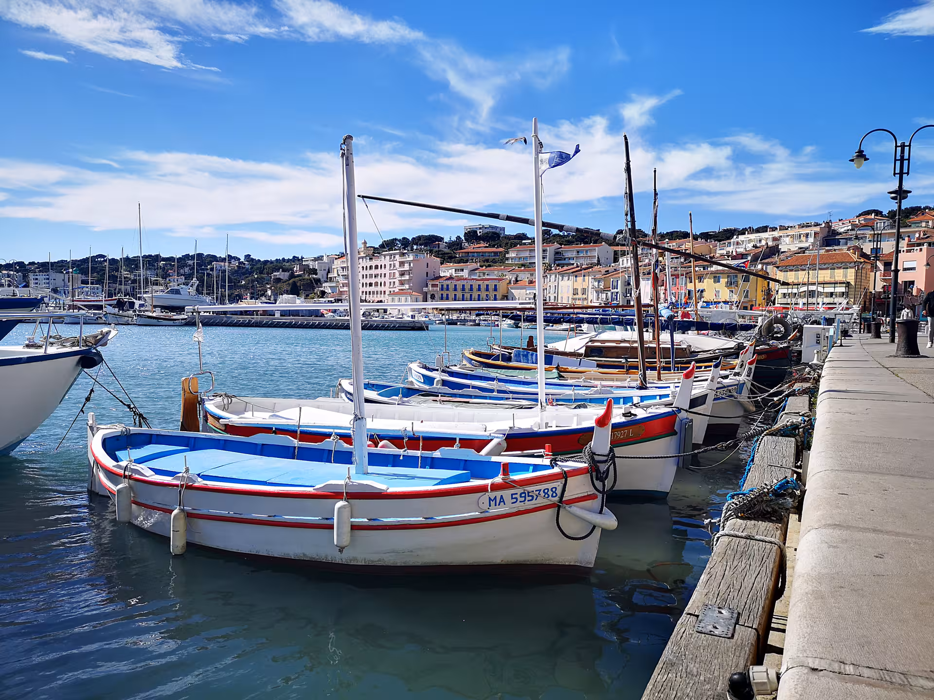 Colorful fishing boats in Cassis harbor, Provence, on a private day trip from Marseille and Le Castellet