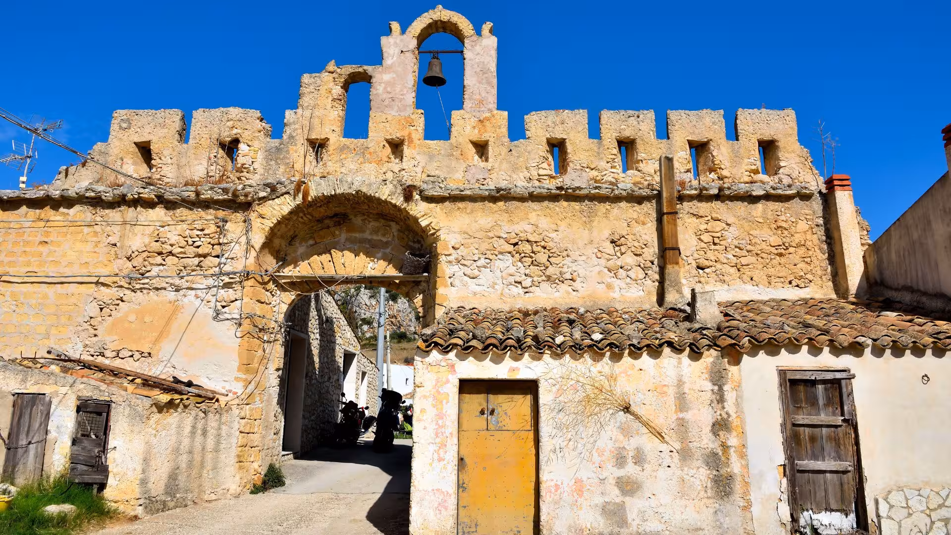 Historic stone architecture in Castellammare del Golfo, showcasing cultural landmarks along the ebike route.