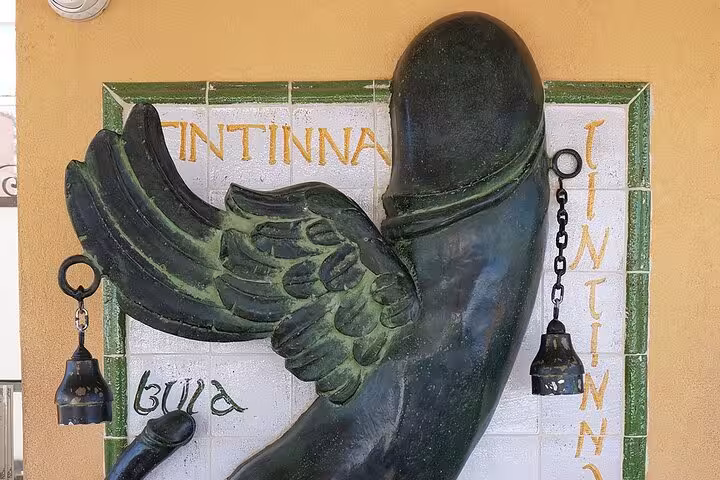 Close-up of a unique sculpture with intricate details in Castelmola, showcasing local art and culture.