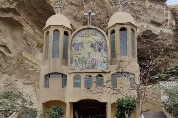 Cave Church of St Simon in Old Cairo, cliffside facade with domes, featured on private Cairo tour