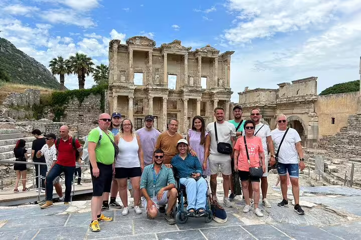 Visitors gather at the iconic Celsus Library in Ephesus on a private tour from Kusadasi Port, ideal for cruise guests.