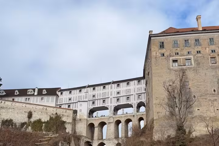 Cesky Krumlov Castle bridge and arcades, scenic stop on a private day tour from Salzburg to Czechia