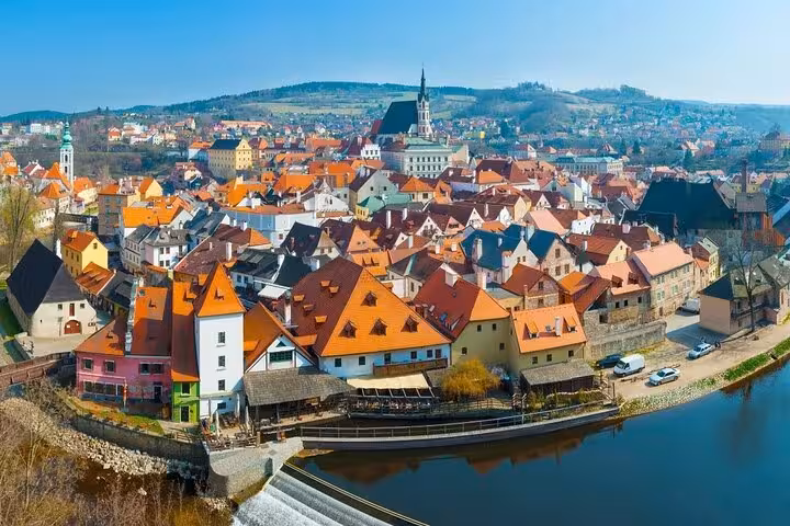 Cesky Krumlov old town rooftops and Vltava River view on private day tour from Salzburg, Czechia