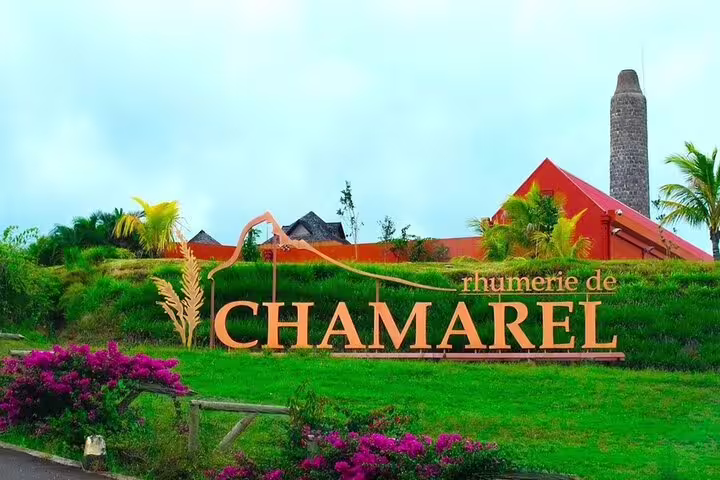 Chamarel Rhumerie entrance sign and distillery grounds, a tasting stop on Hidden Gems of South Mauritius tour