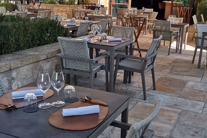 Outdoor terrace dining set for lunch near Château La Gaude, part of Wine Elegance Provence wine tour
