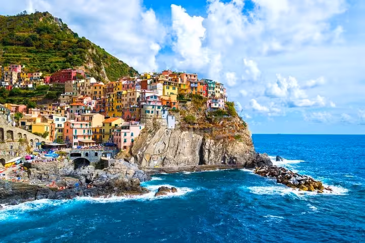 Colorful cliffside village of Cinque Terre overlooking the Mediterranean on a day trip from Florence.
