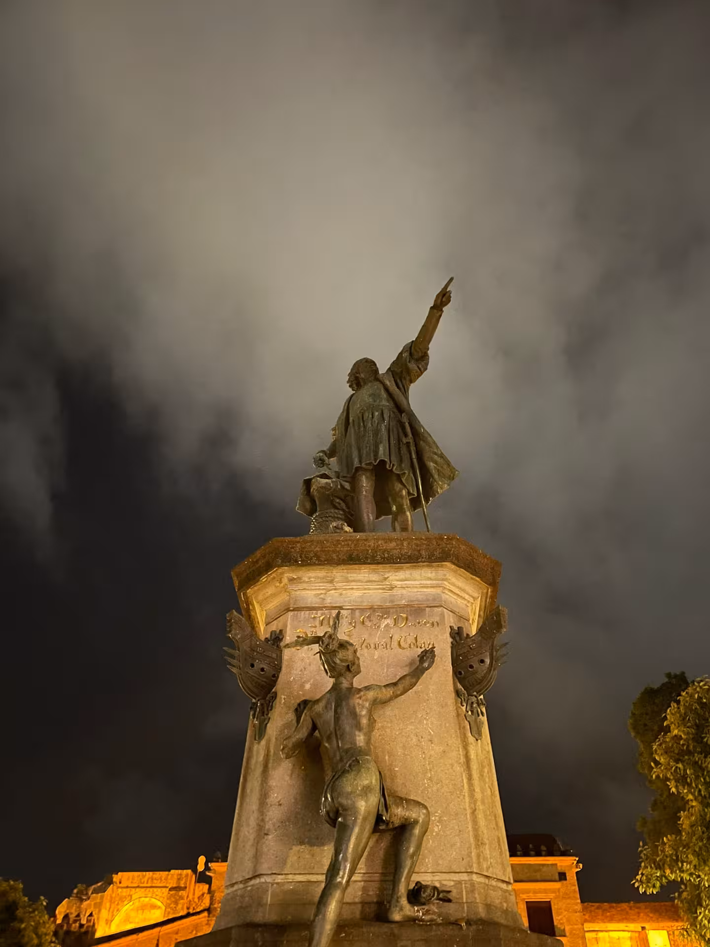 Columbus statue lit at night in Santo Domingo Zona Colonial, Dominican Republic cultural city tour highlight