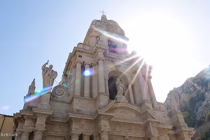 Marvel at the stunning sunlit Baroque cathedral, a key location in the Il Commissario Montalbano travel experience.