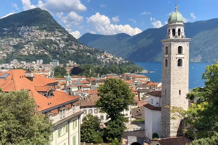 Como city skyline and lake views by bell tower on Milan to Como Bellagio and Lugano Royal Cruise
