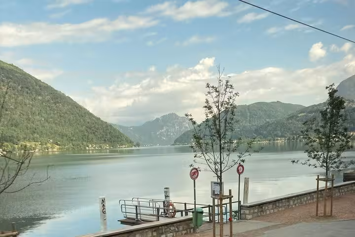 Lakeside promenade view of Lake Lugano en route to Como and Bellagio, scenic cruise and train day trip