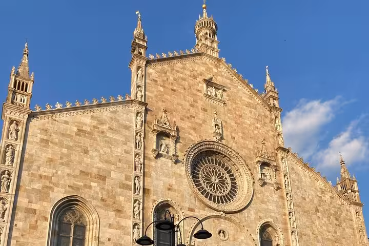 Como Cathedral Duomo facade in historic center, a highlight on Lugano to Como Bellagio day tour