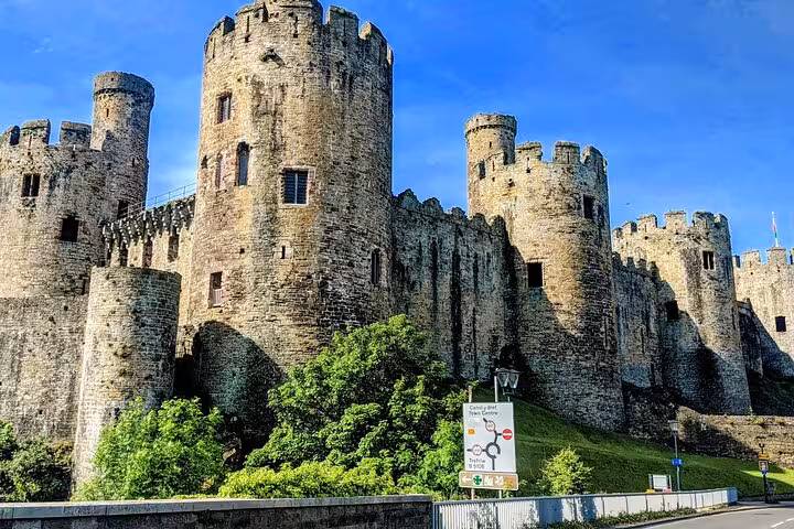Conwy Castle medieval stone towers and walls, a highlight on the Portmeirion and Snowdonia tour