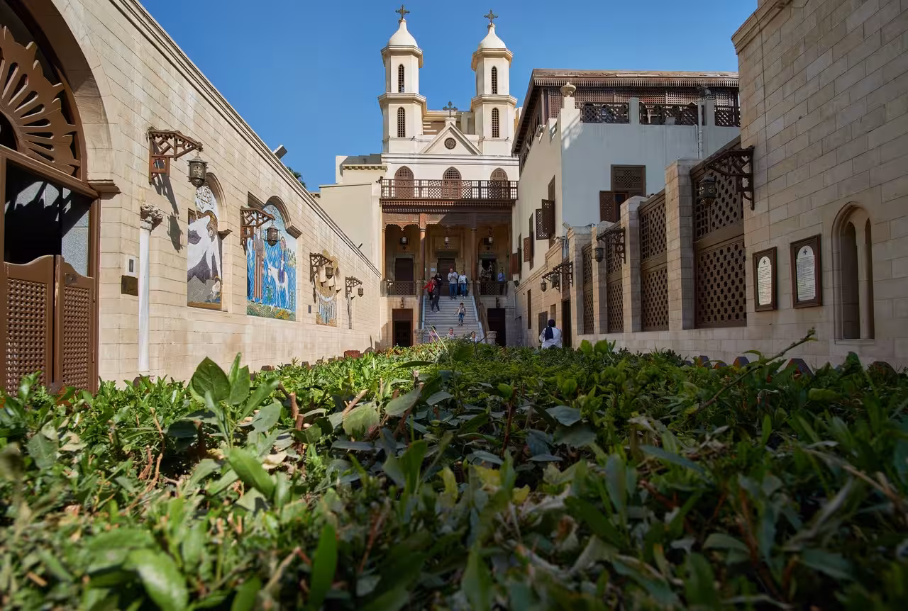 Coptic Cairo church courtyard and mosaics, cultural visit on Egypt Golden Triangle 11-day 5-star holiday