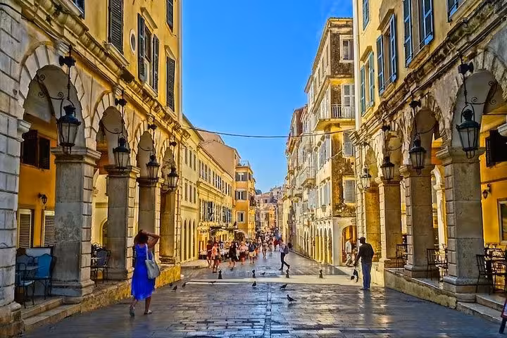 Corfu Town Liston promenade with Venetian arcades and cafes, walking stop on private tour with tastings