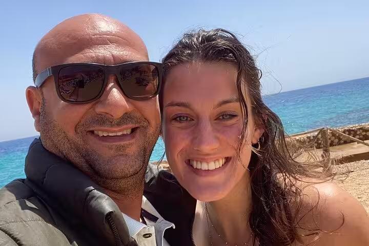 Happy couple selfie by the Red Sea on a day tour to Ain El Sokhna from Cairo, Egypt beach getaway
