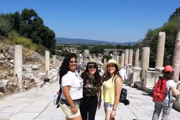 Cruise guests posing on Curetes Street in Ancient Ephesus during Kusadasi Port private Ephesus tour