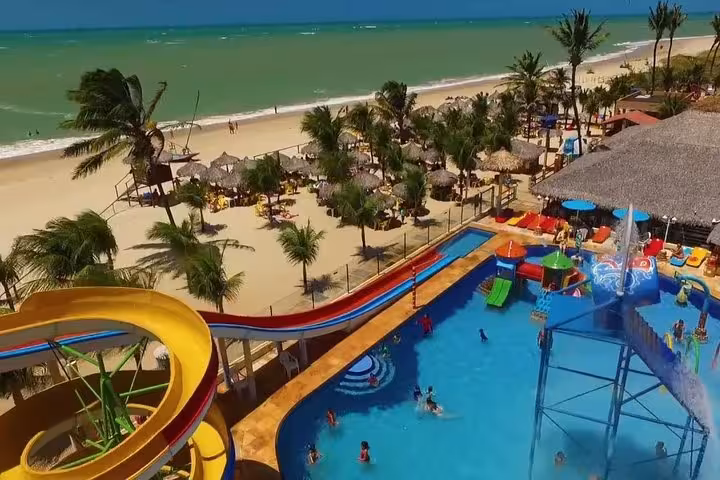 Beachfront water park and pool beside Cumbuco Beach, popular family stop on a Cumbuco Beach tour from Fortaleza
