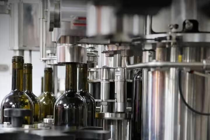 Wine bottling line at a Cyprus winery visit, part of The Aphrodite Experience with Bath of Aphrodite tour