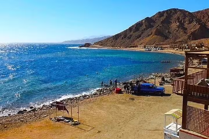 Red Sea coastline near Dahab on the Sharm el Sheikh day tour to 3 Pools National Park snorkeling spot