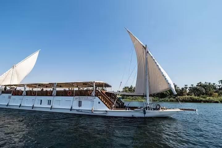 Traditional dahabiya sailboat cruising the Nile River, ideal 5 days 4 nights Dahabiya Nile cruise in Egypt