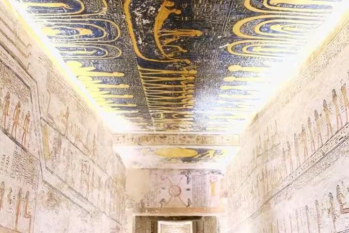 Painted ceiling and hieroglyph walls inside an ancient Egyptian tomb on a 5 day 4 night Dahabiya Nile cruise