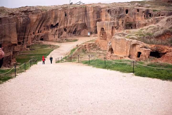 Path through Dara ancient rock-cut city ruins, scenic walk on an all-inclusive private 10-day Mesopotamia tour