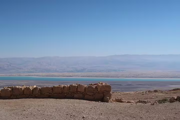 Dead Sea panorama viewed from Masada lookout on a private Tel Aviv day tour, with salt flats and hills