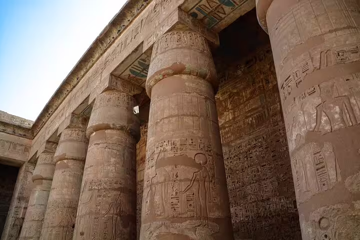 Hypostyle hall columns with hieroglyphs at Dendera Temple complex, Luxor tour to Medinet Habu