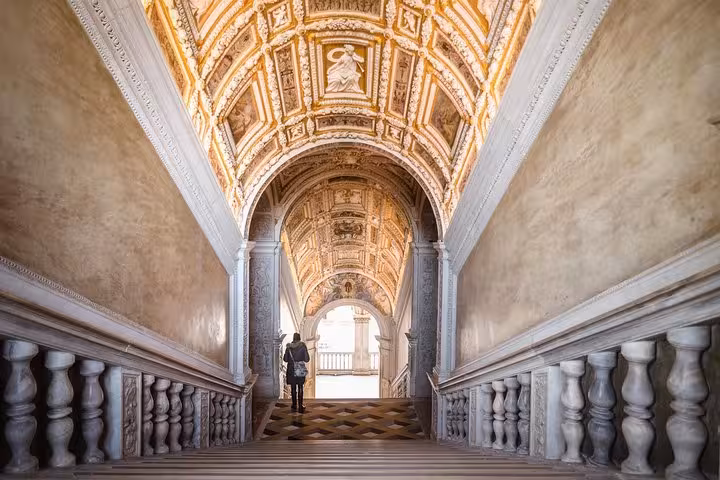 Explore the stunning gilded staircase with ornate ceilings at Doge's Palace on a skip-the-line guided tour.