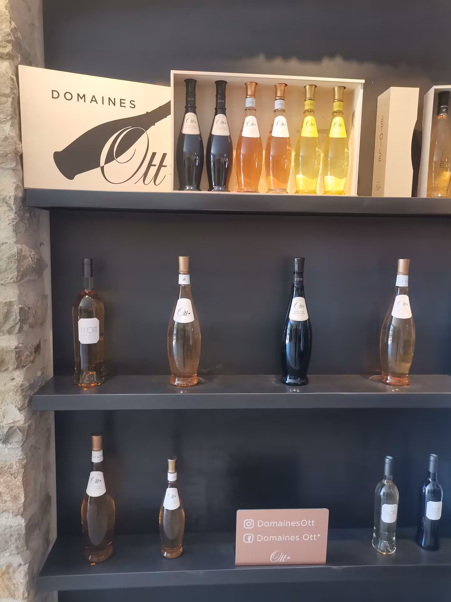 Domaines Ott wine bottles display for AOP Côtes de Provence tasting on Saint-Tropez countryside wine tour