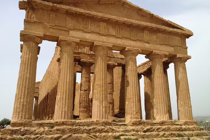 Well-preserved Doric temple in the Valley of the Temples, Agrigento, featured on a private guided archaeological tour