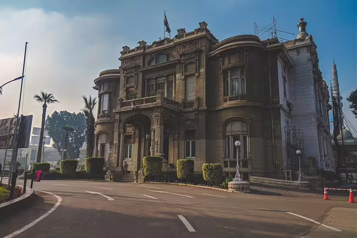 Historic downtown Cairo palace-style building on city tour route, exploring landmarks before Egyptian dinner