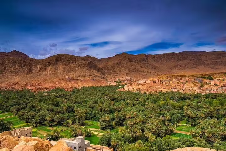 Draa Valley palm oasis and Berber village view on 4 days 3 nights desert tour from Marrakech to Merzouga