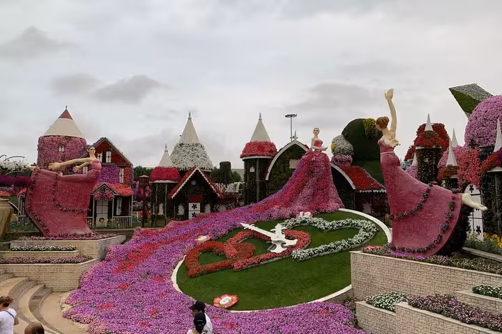 Dubai Miracle Garden floral princess castle display on Global Village combo tour with transport from Fujairah