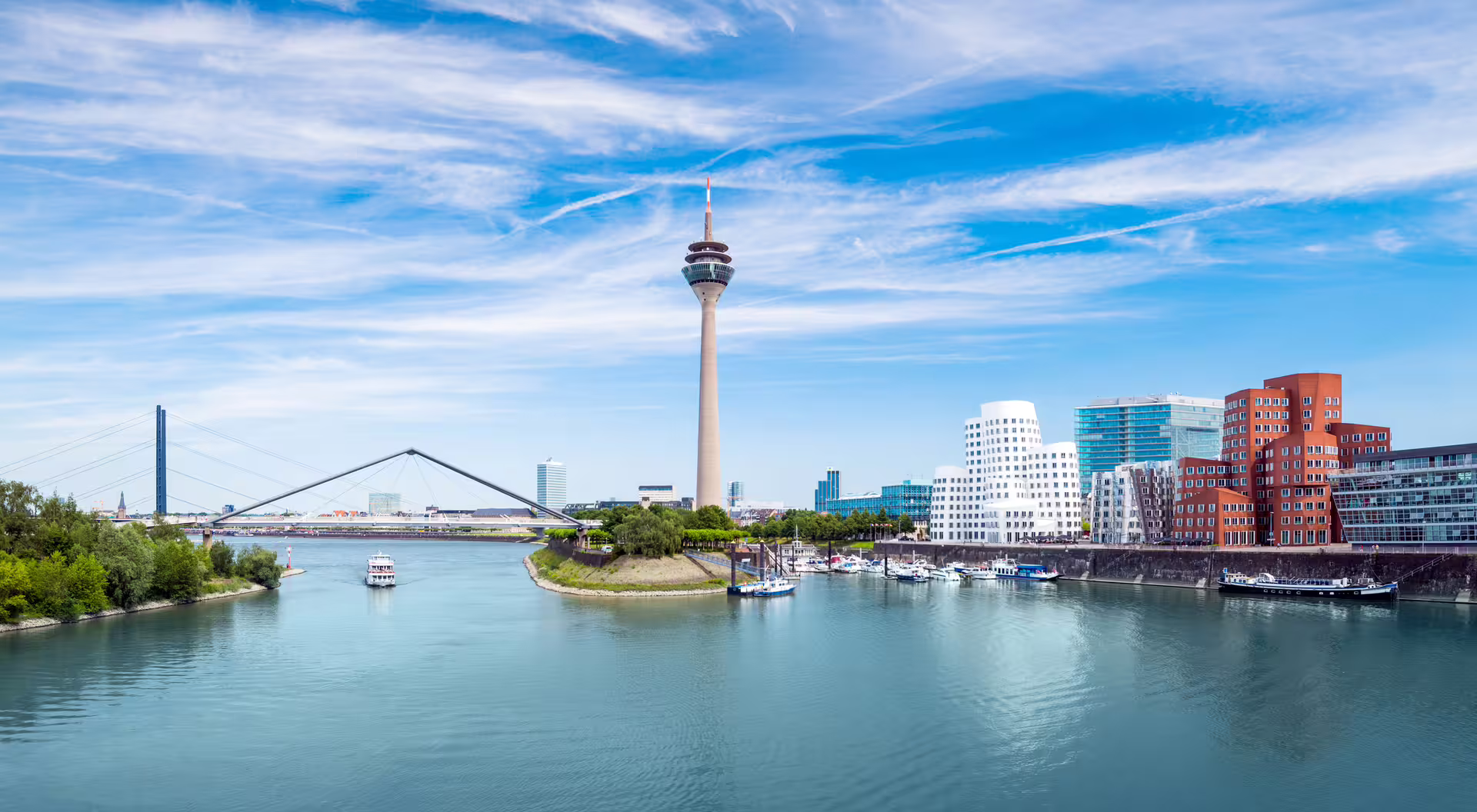 Rhine River skyline with Rheinturm and MedienHafen, perfect for Dusseldorf 1 day walking tour audioguide