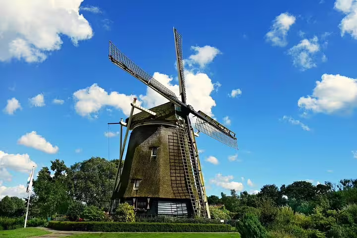 Traditional Dutch windmill stop on a private half-day Amsterdam sightseeing tour in the countryside