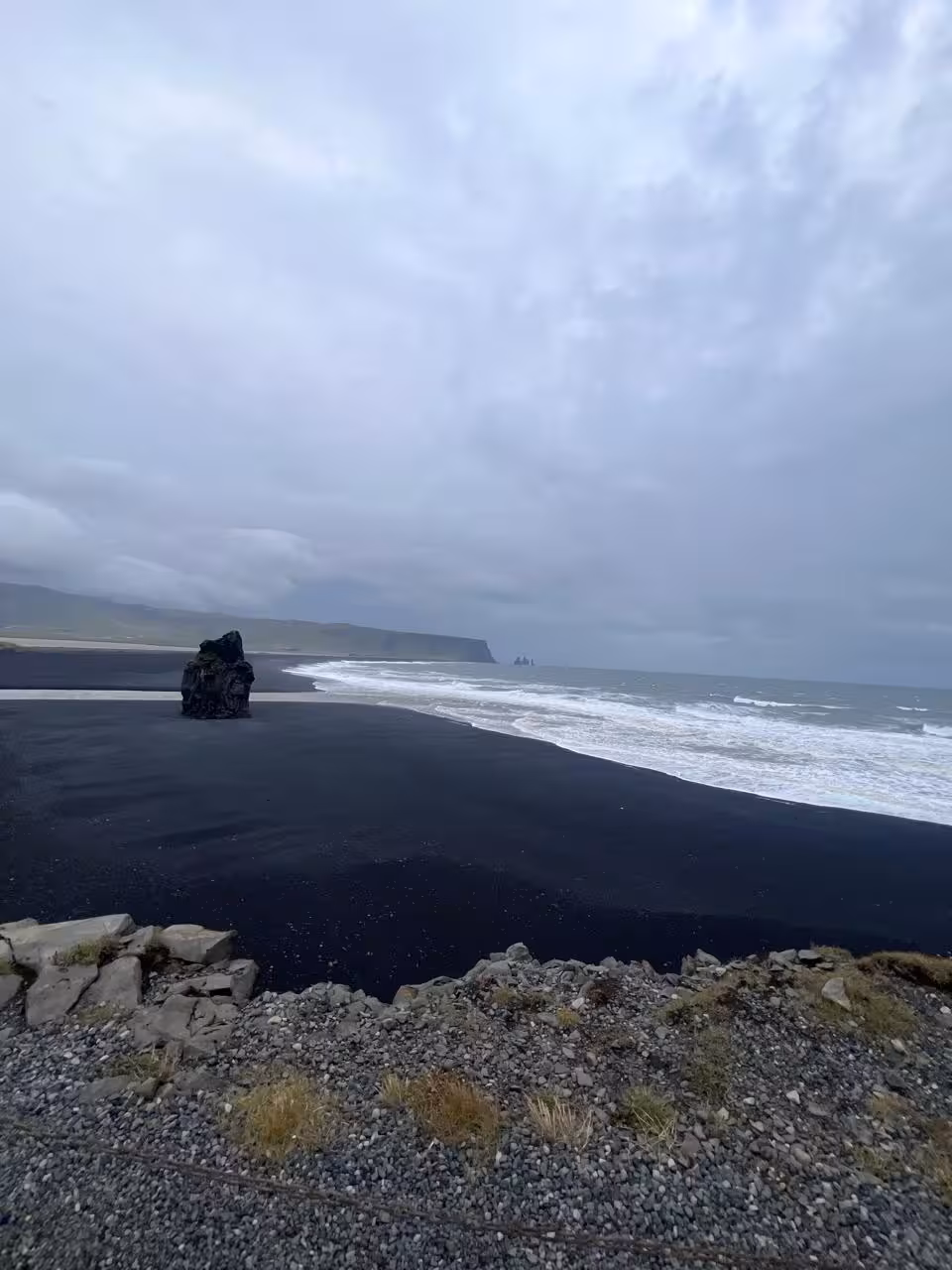 Dyrhólaey area black sand coastline with Atlantic waves on South Coast private tour from Reykjavik, Iceland