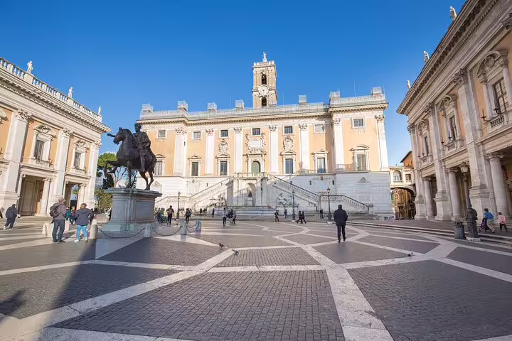 Early morning view of Rome’s Capitoline Hill square with statue and palazzo on guided walking tour of top historic sights